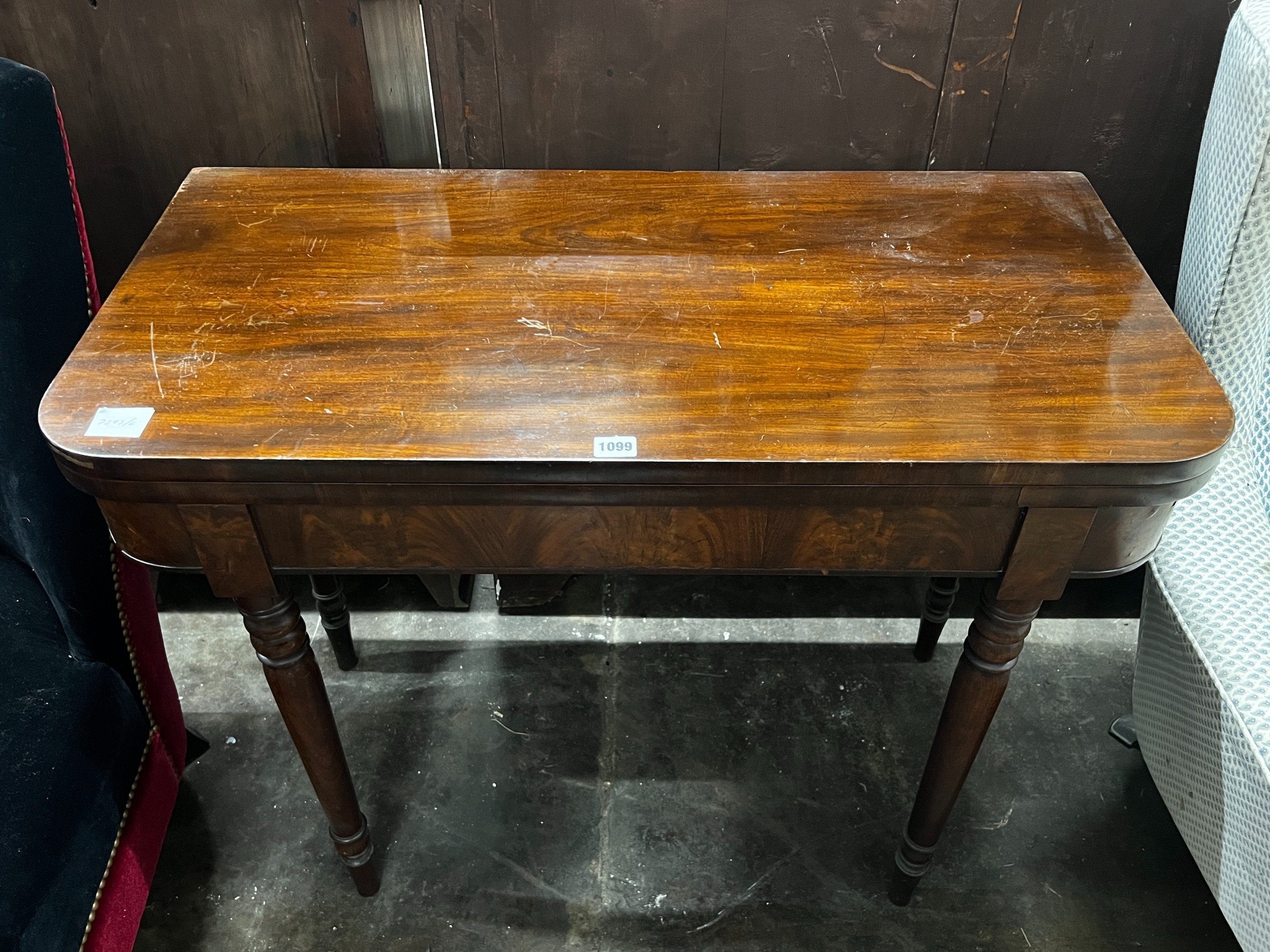 A Regency mahogany folding tea table, width 91cm, depth 45cm, height 75cm